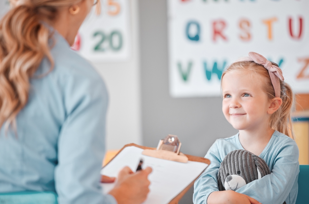 pediatrician talking to a child.